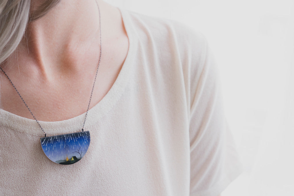 Model wearing snake campfire necklace