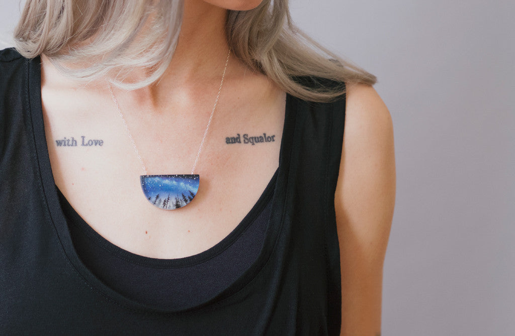 Model wearing milky way necklace