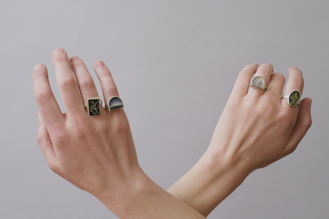 Model wearing feather ring