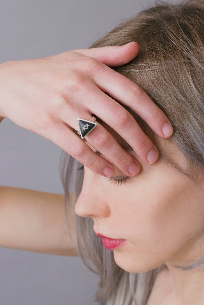 Model wearing vertebra ring