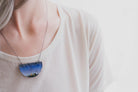 Model wearing snake campfire necklace