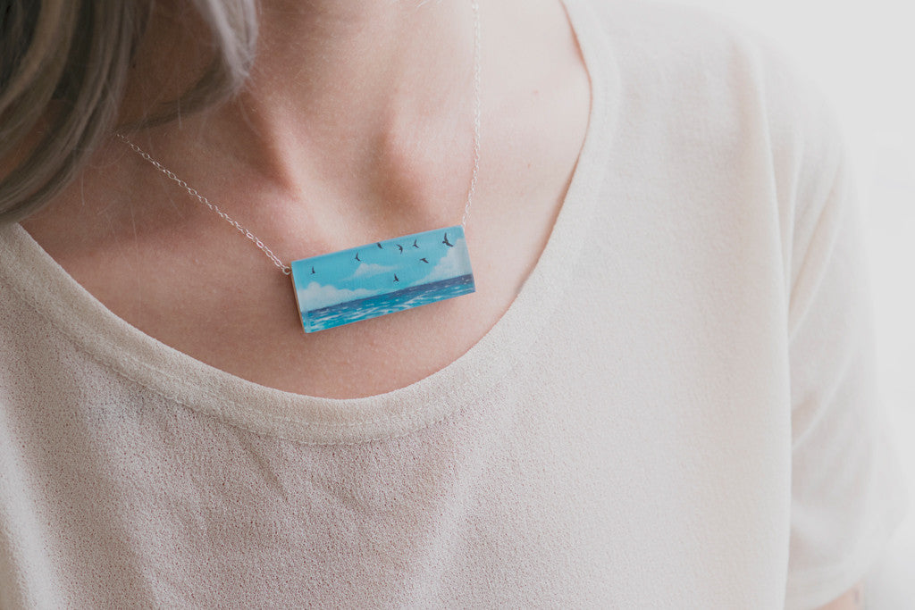 Model wearing seas necklace